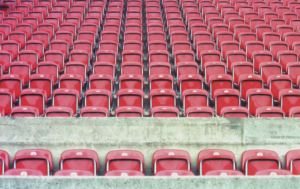 empty red stadium seats